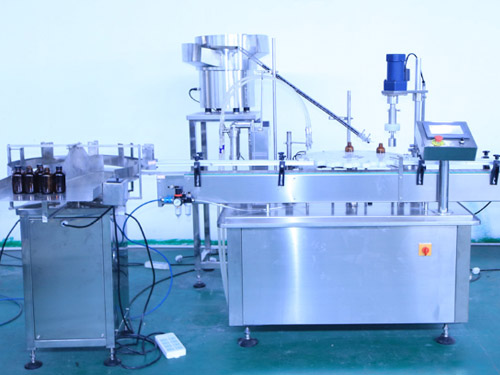 oral filling machine with rubber stopper